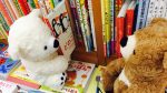 Stuffed animals reading